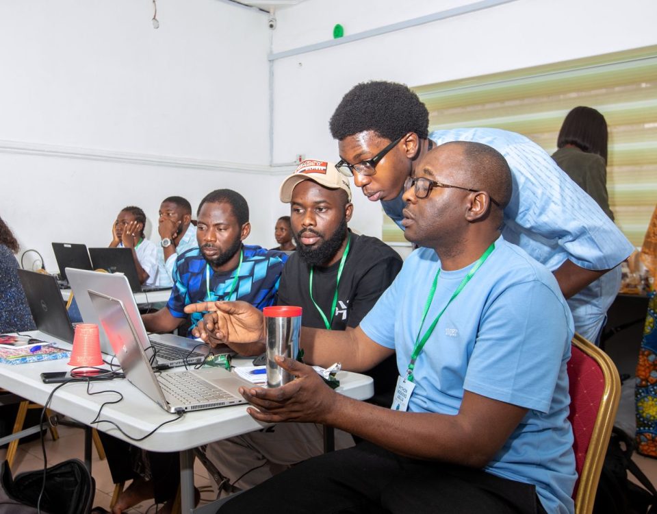 Students learning artificial intelligence skills at Code Campus